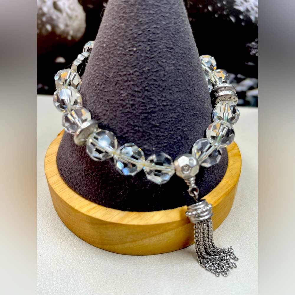 Signed Swarovski Crystal bead w/tassel stretch bracelet
